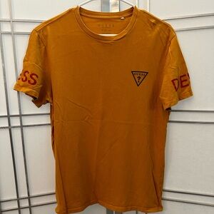Worn once!  Mens size Medium. Guess brand T shirt.